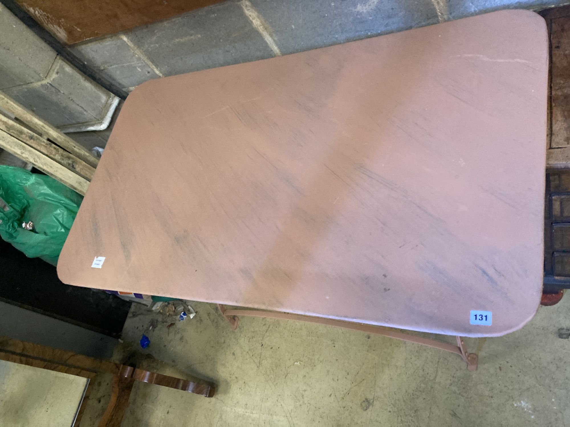 A painted metal folding garden table, width 124cm, depth 72cm, height 74cm